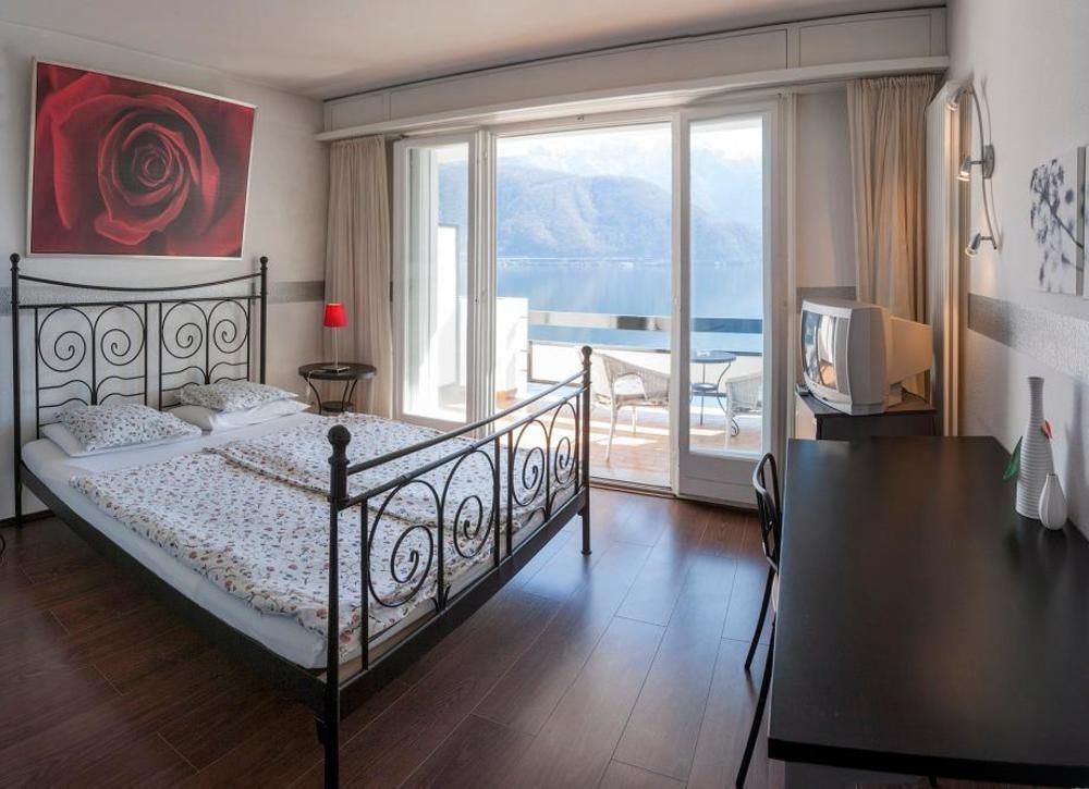 Hotel Garni Battello Melide Bagian luar foto