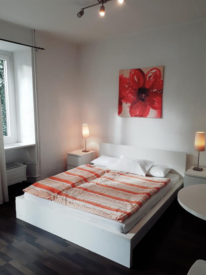 Hotel Garni Battello Melide Bagian luar foto