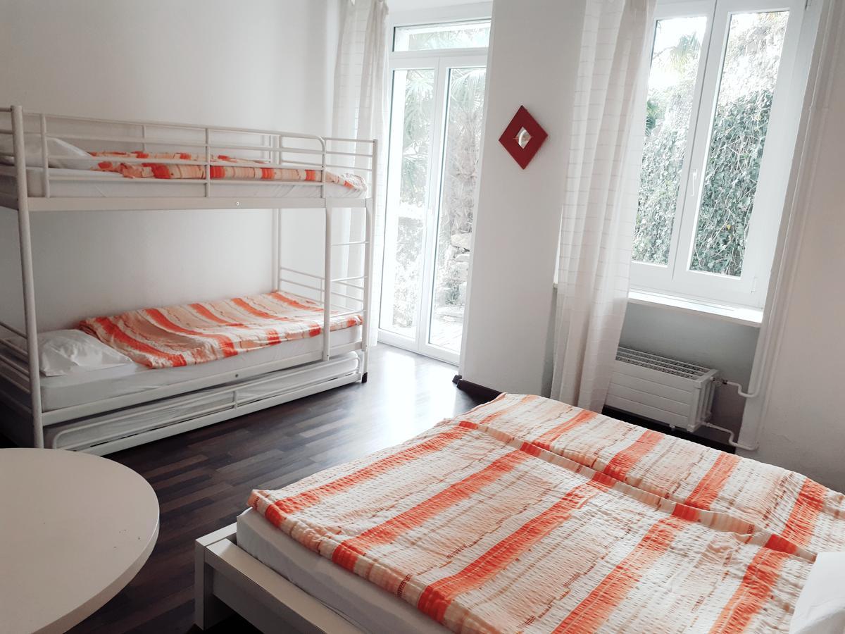 Hotel Garni Battello Melide Bagian luar foto
