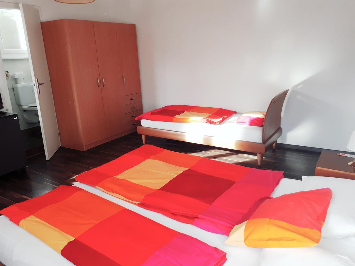Hotel Garni Battello Melide Bagian luar foto