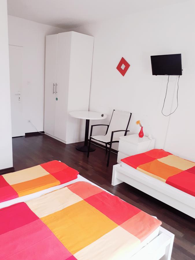 Hotel Garni Battello Melide Bagian luar foto