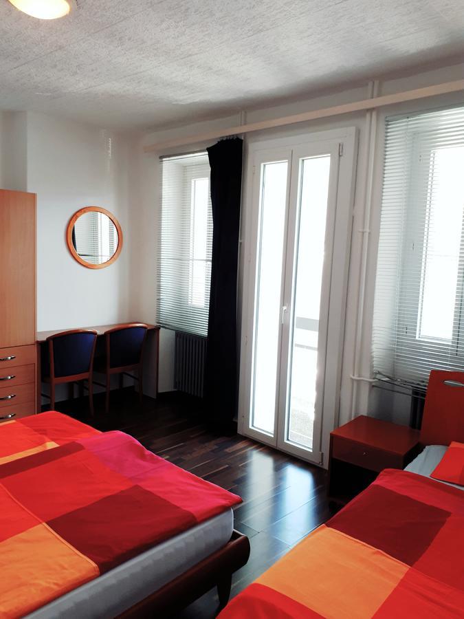 Hotel Garni Battello Melide Bagian luar foto