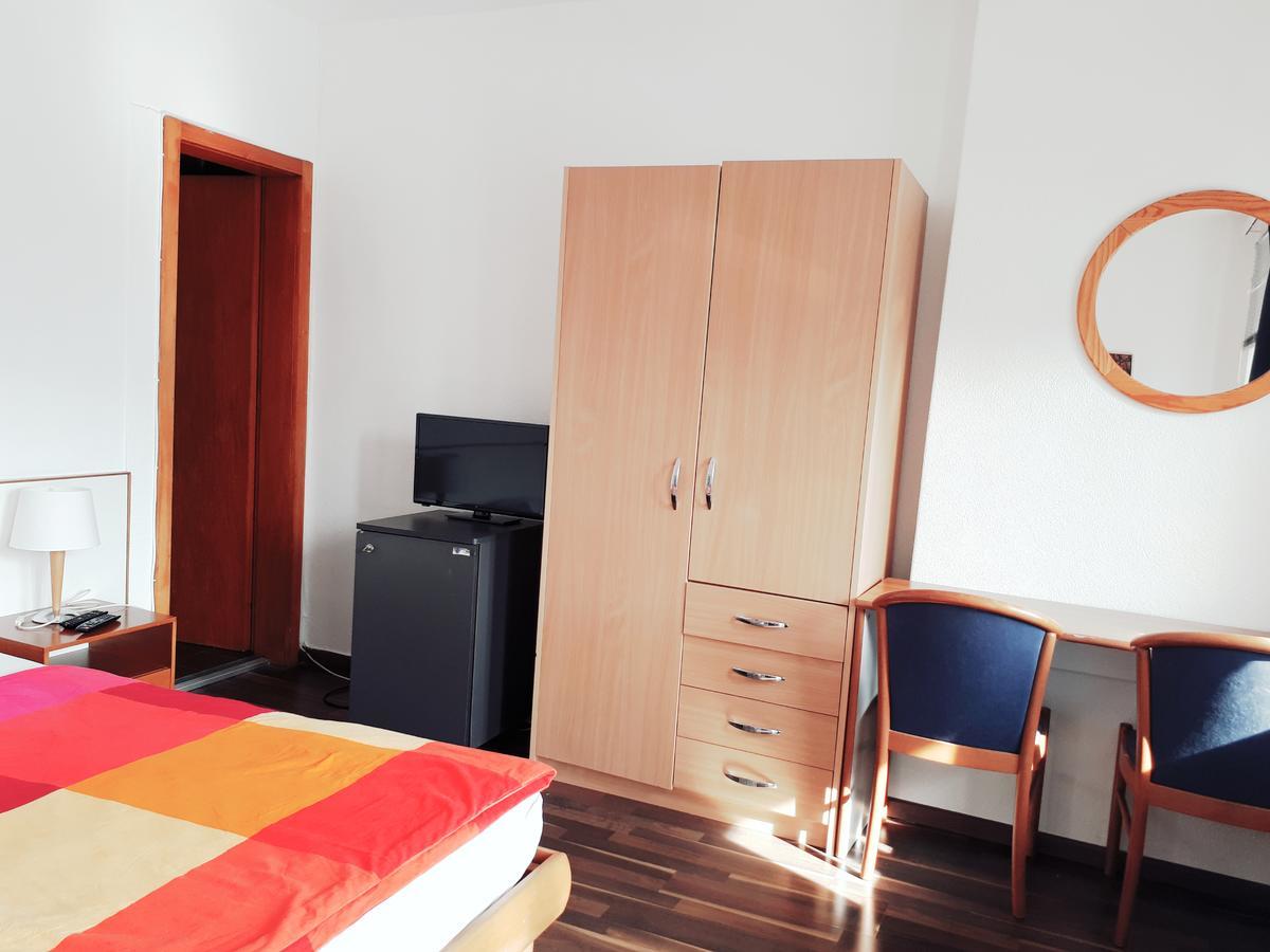 Hotel Garni Battello Melide Bagian luar foto