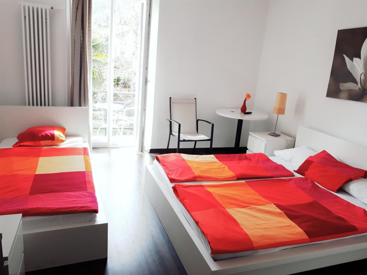 Hotel Garni Battello Melide Bagian luar foto