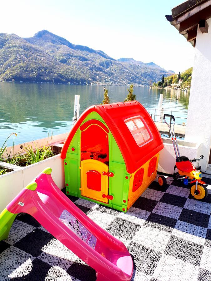 Hotel Garni Battello Melide Bagian luar foto
